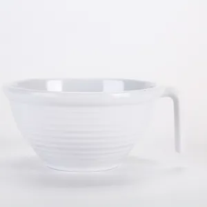 White melamine ribbed mixing bowl detail view, durable plastic tableware with convenient handle.