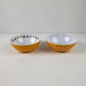 Melamine salad bowl set with colorful fruit pattern and polka dot design for children dining.