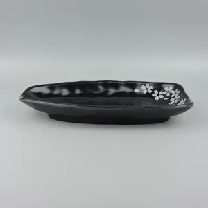 Black melamine long plate with pink cherry blossom pattern for sushi and snacks dinnerware.