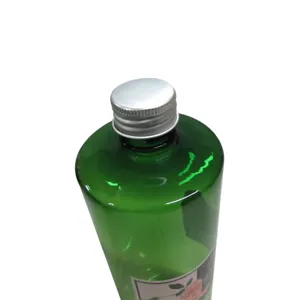 500ml green aromatherapy essential oil bottle with silver screw cap and floral label design.
