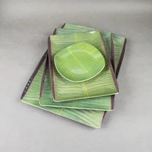 Ensemble d'assiettes en mélamine en forme de feuille de bananier, plat rectangulaire motif feuille.