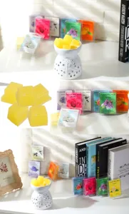 Scented wax melts and ceramic burner set, perfect for home fragrance and aromatherapy.