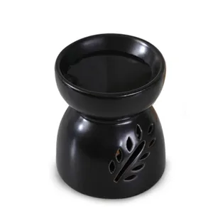 Quemador de cera de cerámica negro mate con diseño de hojas