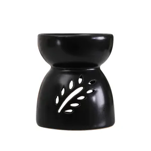 Quemador de aceite cerámico negro mate elegante con diseño hueco en forma de hoja