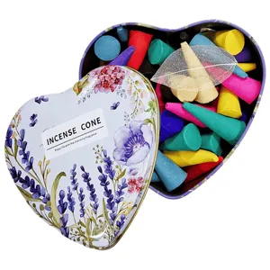 Heart-shaped tin box filled with colorful scented incense cones for daily home relaxation and meditation.