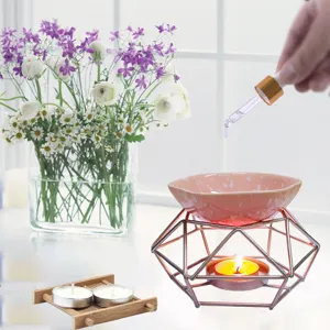 Bruciatore di aromaterapia in ferro esagonale diffusore di oli essenziali candela
