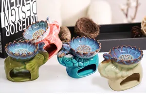 Vier kleurrijke keramische olifant aromatherapie branders met ijs barst lotus schalen