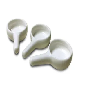 Close-up detail of white ceramic small tray with handle, smooth glaze for candle holder.