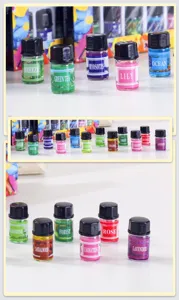 Vista dettagliata di 12 flaconi di olio essenziale profumato da 3ml per aromaterapia.