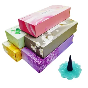 Wierookkegel set met kleurrijke bloemverpakking doosjes en blauwe lotus houder thuis