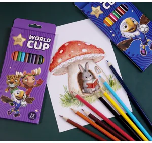 Close-up detail shot of 12-color oil colored pencils with World Cup themed packaging and drawing.