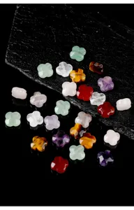 Macro view of multi-color natural stone clover beads for jewelry making