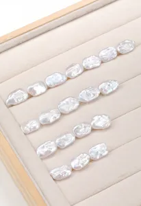 Exquisite macro detail of natural white baroque rectangular pearl beads for DIY jewelry craft