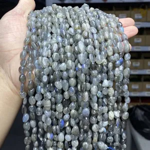Detail of natural 6-8mm grey labradorite irregular beads with vibrant blue flash