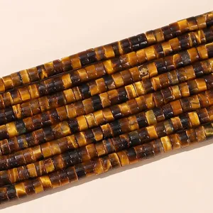 Macro detail view of 4x2mm natural yellow tiger eye disk spacer beads for DIY jewelry.