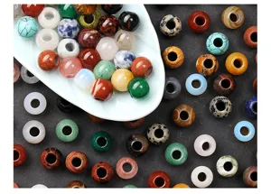 Detailed view of colorful natural crystal stone beads with large holes for DIY jewelry
