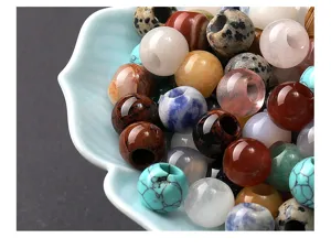 Close-up macro detail showing varied textures of natural crystal large hole beads for DIY