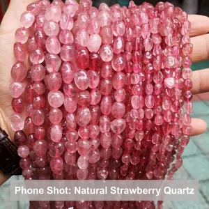 Detailed macro view of irregular natural pink strawberry quartz beads for DIY jewelry making