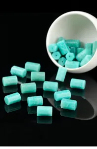 Macro detail of natural teal Amazonite beads with unique stone textures and reflections