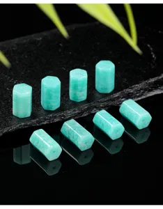Close-up macro shot of natural Amazonite hexagonal prism beads for DIY jewelry crafting