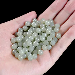 Natural Hetian jade loose beads for DIY jewelry making macro view