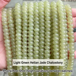 Macro shot of pale green Hetian Jade chalcedony abacus beads for DIY jewelry making