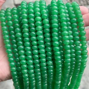 Close-up of vibrant green chalcedony abacus beads for DIY jewelry making.