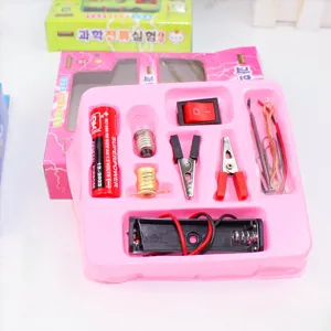 Detailed view of DIY physics circuit kit with battery, switch, and bulb components