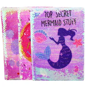 Reversible sequin mermaid notebook detail featuring sparkling fish scale cover design.