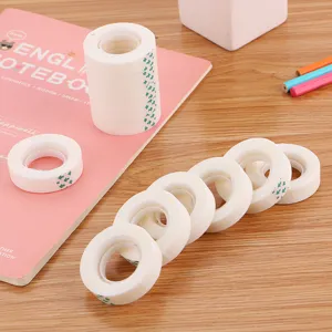 Small white invisible adhesive tape rolls for office and school stationery writing use today.