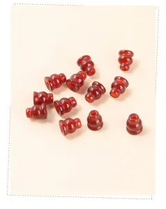 Close-up of natural red agate gourd-shaped beads for DIY jewelry making accessories