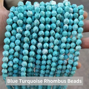 Detailed macro shot of faceted light blue turquoise lozenge beads for DIY jewelry making