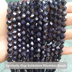 Close-up macro view of synthetic blue goldstone diamond faceted loose beads for DIY jewelry