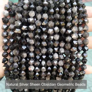 Detailed macro view of faceted natural silver sheen obsidian rhomboid stone beads for jewelry