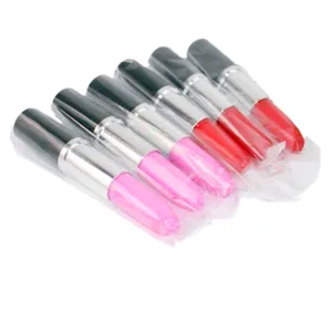 Lipstick-shaped ballpoint pens in multiple pink and red colors, individually wrapped.