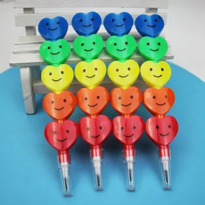 Cute colorful heart stacking pencils with smiley faces, non-sharpening student stationery detail