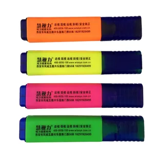 Set of four vibrant fluorescent highlighters in orange, yellow, pink, and green colors