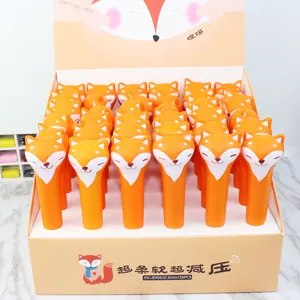 Close-up detail of the cute orange fox gel pens in a display box, soft and slow rebound design.