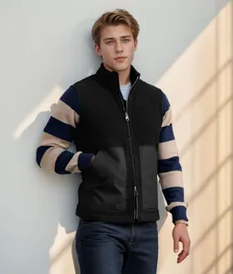 Men's fleece vest detail showing cozy sherpa fabric, full zipper and utility pockets.