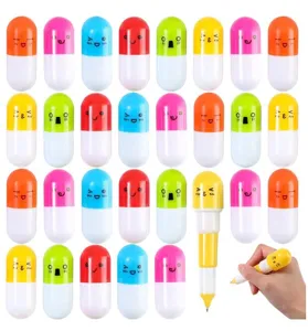 Colorful collection of capsule-shaped telescopic ballpoint pens with various cute emoji faces