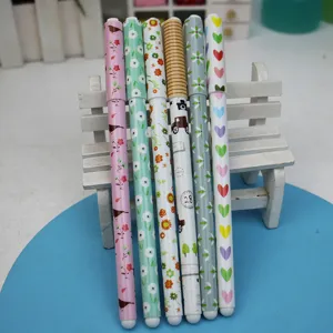 Set of 6 cute cartoon black ink gel pens with floral and heart patterns for students