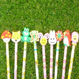 Detailed view of cute cartoon animal eraser topped wooden pencils in vibrant assorted designs.