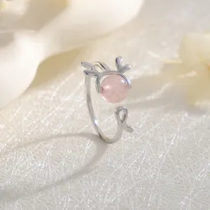 Delicate silver elk antler open ring featuring a round pink strawberry quartz bead for women