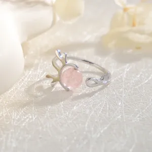 Elegant silver antler ring featuring a delicate pink strawberry quartz bead for women.