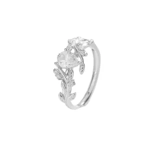 Élégante bague branche argentée avec deux zircons poires et motifs de feuilles délicats