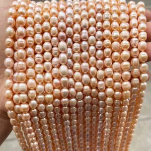 Hochwertige rosa Süßwasser-Reisperlen mit natürlichen Ringstrukturen für DIY-Schmuck