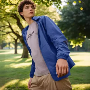 Detailed view of the blue lightweight hooded sun protection jacket for men outdoors.