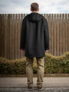 Manteau en laine noir à capuche pour homme, veste unie à manches raglan pour l'automne et l'hiver.