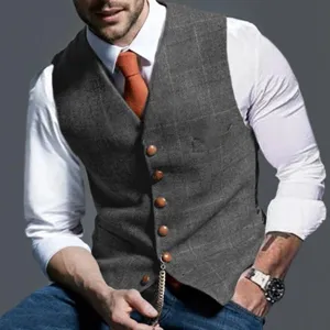 Macro detail of a grey plaid waistcoat featuring single-breasted brown buttons for men.