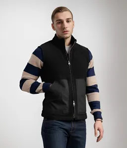 Men's casual fleece vest detail shot showing lamb wool fabric texture, front zipper and pockets.